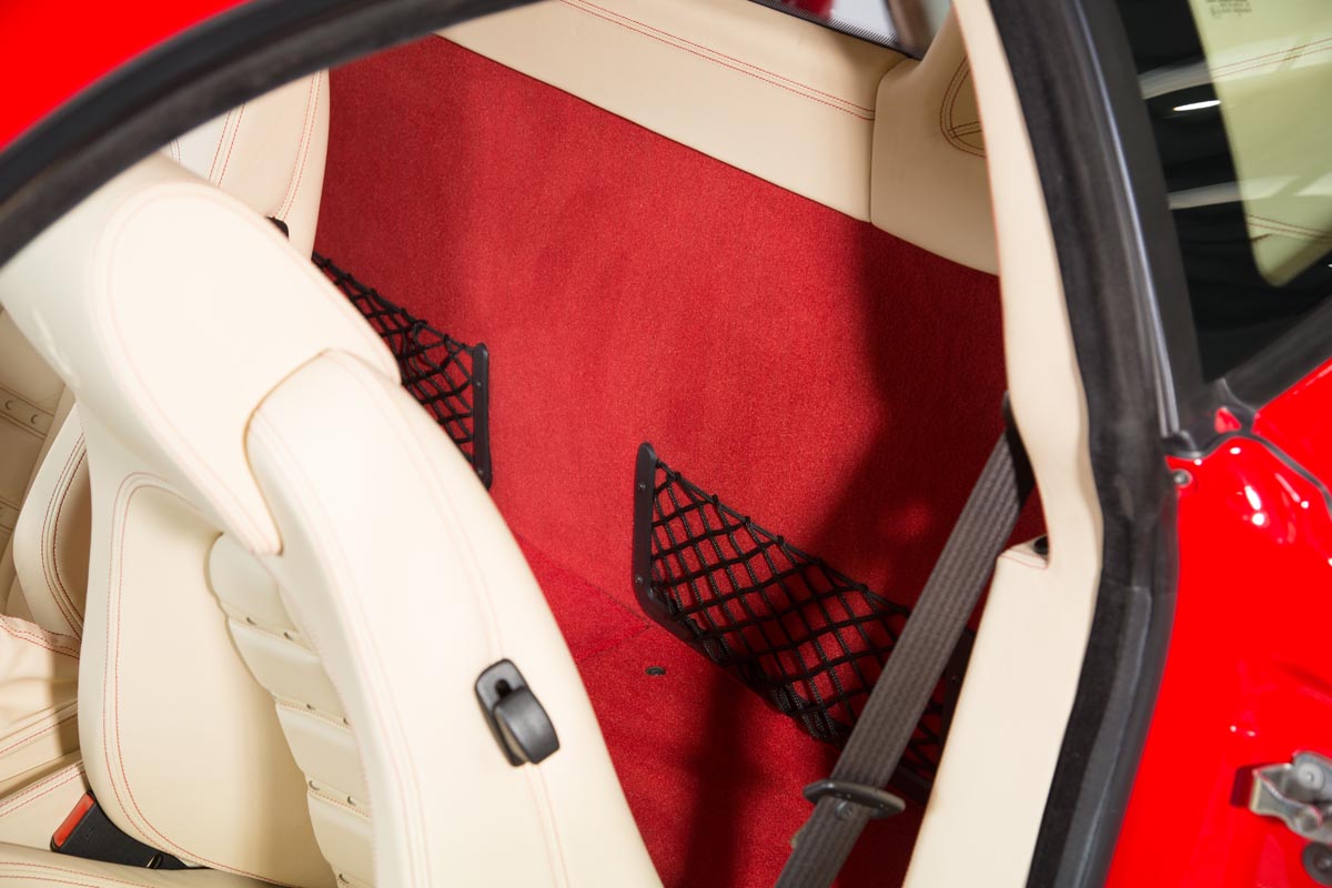 Frame elastic nets behind car seats