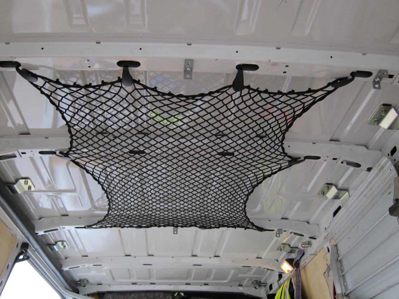 Custom-made elastic net to fit the roof of a van