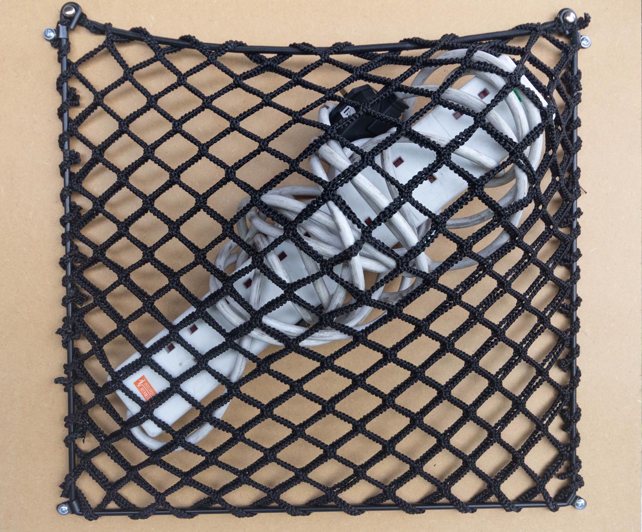 BBespoke double layer frame elastic net showing storage of an extension cord