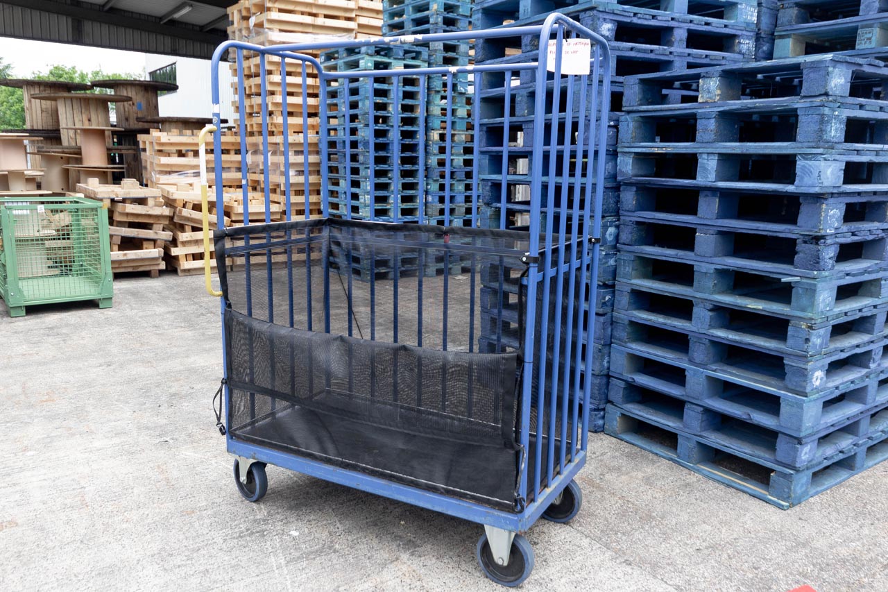 Bespoke roll cage trolley net with front flap opened downwards.