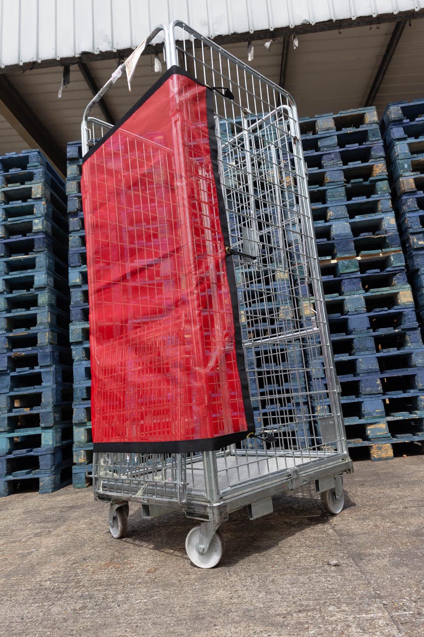 Bespoke red mesh roll cage cover.