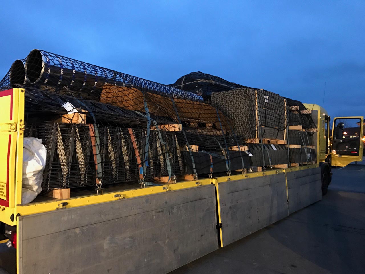 Customer photo showing extra heavy duty cargo nets as part of a load control solution on the back of a truck.