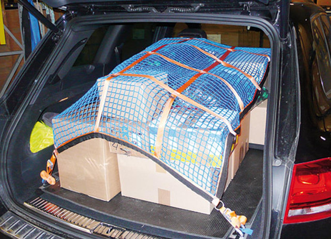 Example of a cargo load restraint net with webbing and fittings integrated.